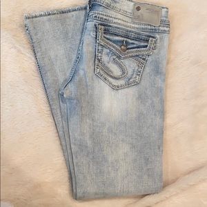 Silver low rise boot cut jeans